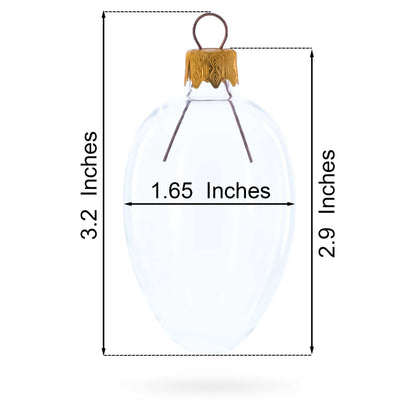 Clear glass egg ornament with a gold metal cap and wire loop. Printed dimensions show 2.9 inches and 1.65 inches.