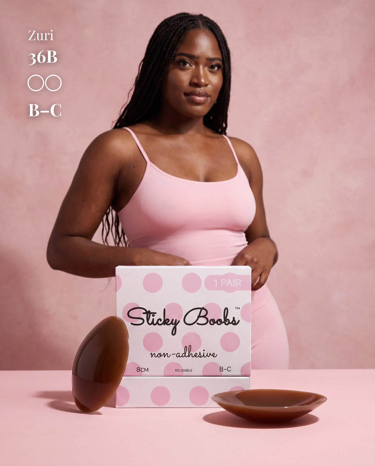 Model in a pink camisole behind Dark nipple covers and B–C packaging, with a 36B size label.