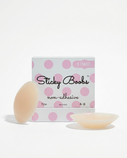 Light non-adhesive silicone nipple covers with Sticky Boobs packaging labeled A–B, 7 cm.