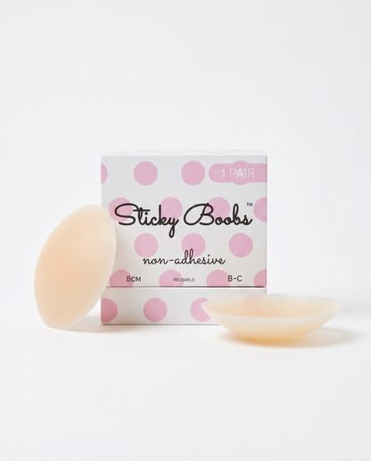 Light non-adhesive silicone nipple covers with Sticky Boobs packaging labeled B–C, 8 cm.