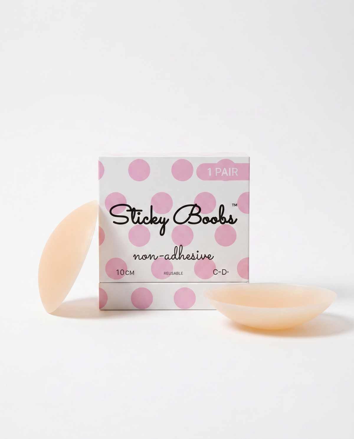 Light non-adhesive silicone nipple covers with Sticky Boobs packaging labeled C–D+, 10 cm.