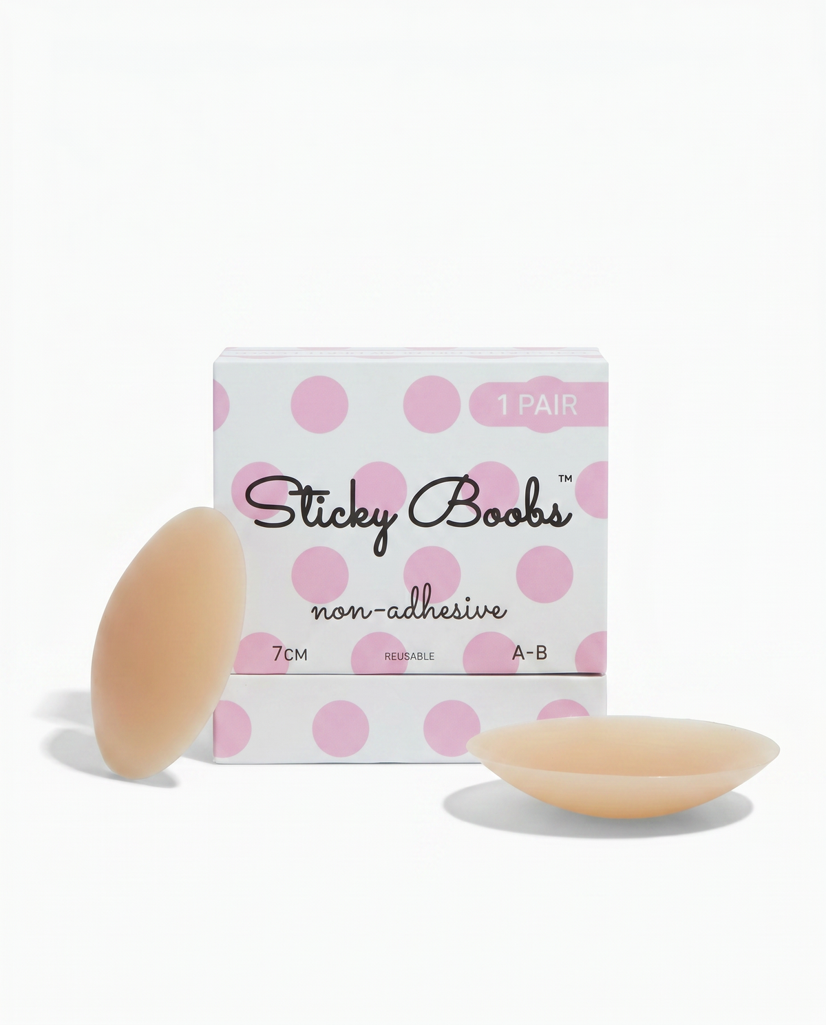 Tan non-adhesive silicone nipple covers with Sticky Boobs packaging labeled A–B, 7 cm.