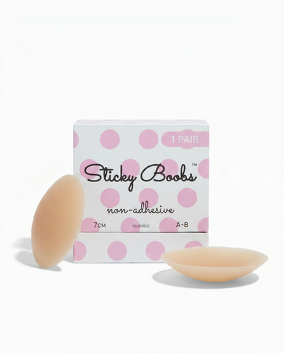 Tan non-adhesive silicone nipple covers with Sticky Boobs packaging labeled A–B, 7 cm.