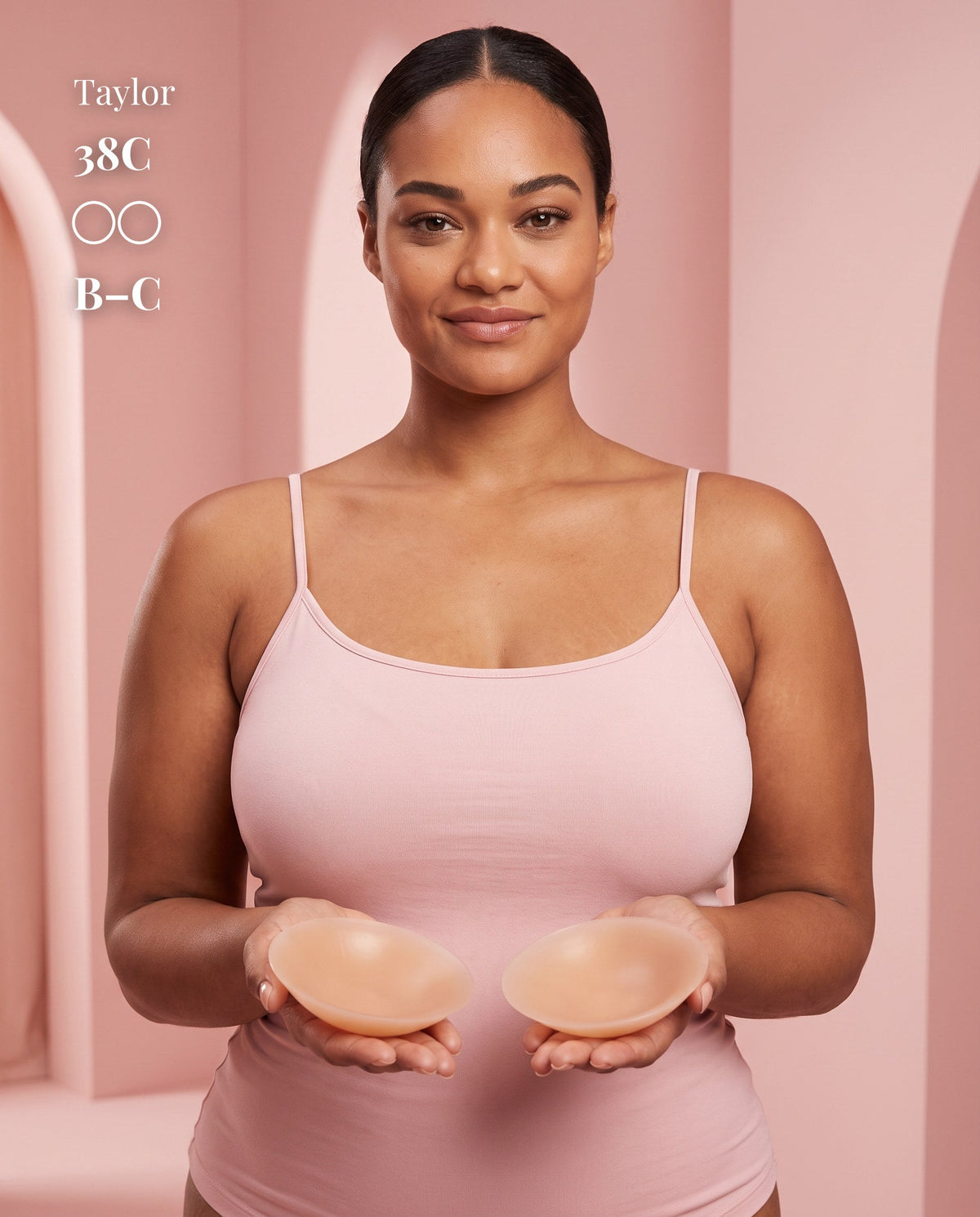 Model in a pink camisole holding two Tan nipple covers, with labels showing 38C and B–C.