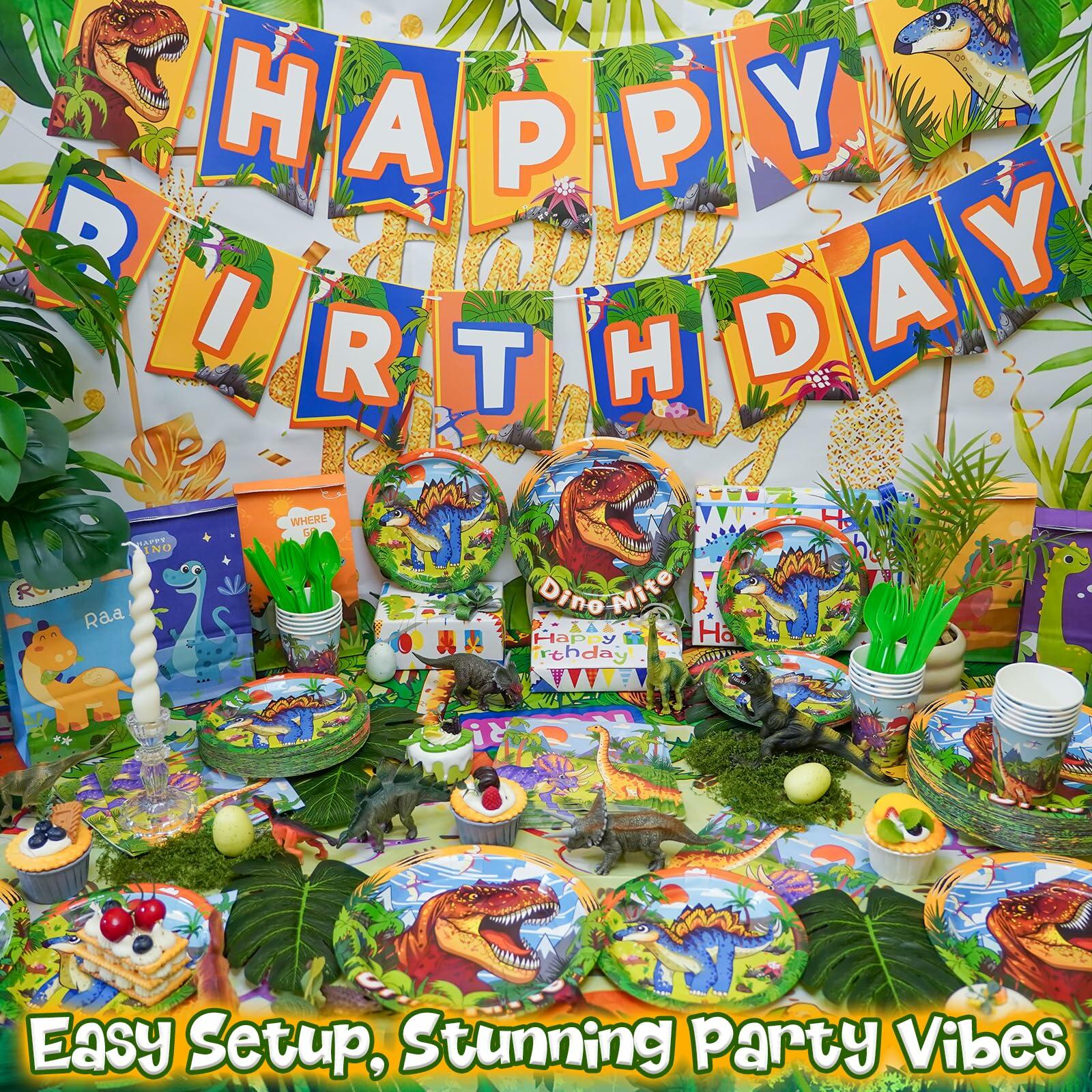 Dinosaur-themed birthday party setup with decorations, plates, and banners.