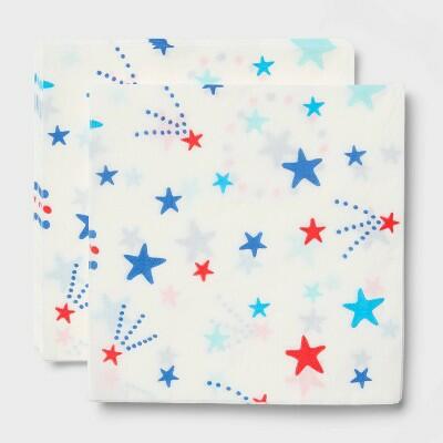 Two sheets of paper with star patterns on a white background