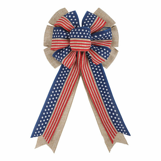 American flag burlap wreath bow featuring red, white, and blue stripes with star patterns and natural burlap accents.