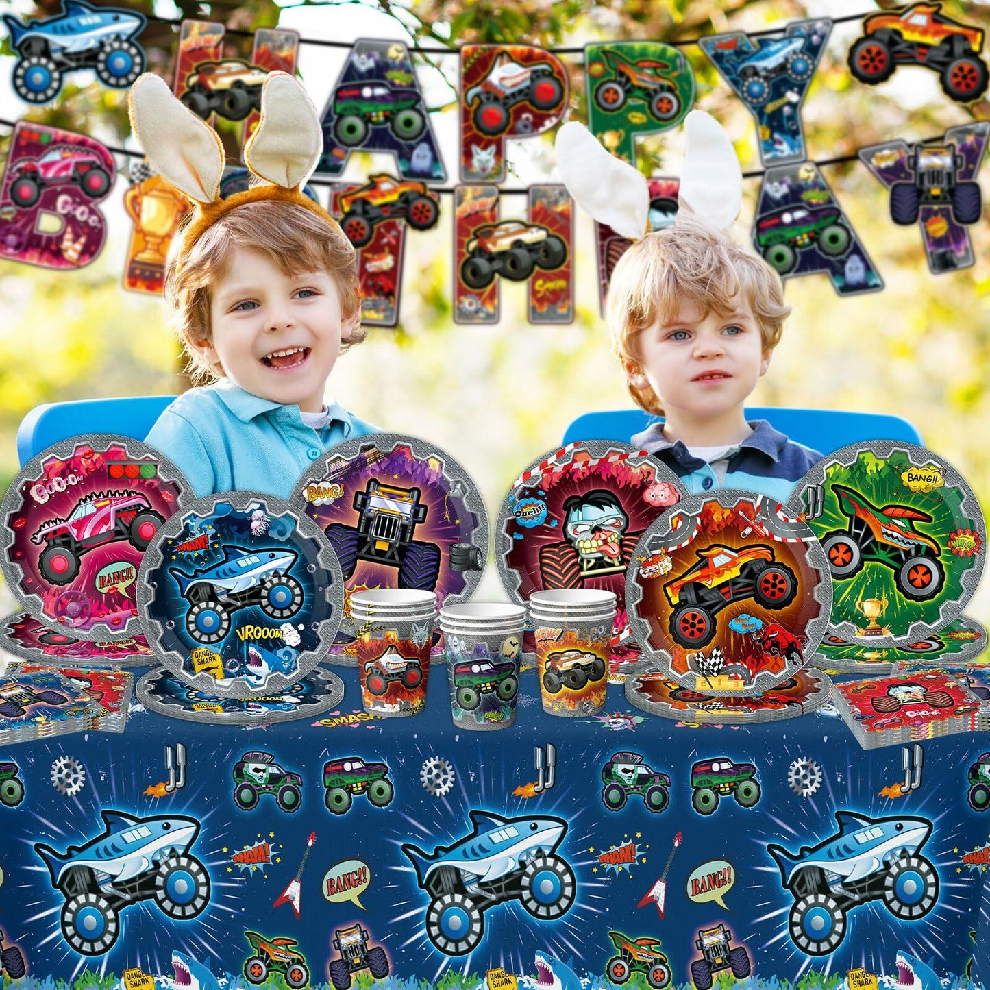 Truck-themed birthday party supplies including plates, napkins, cups, and a colorful banner with children wearing bunny ears.
