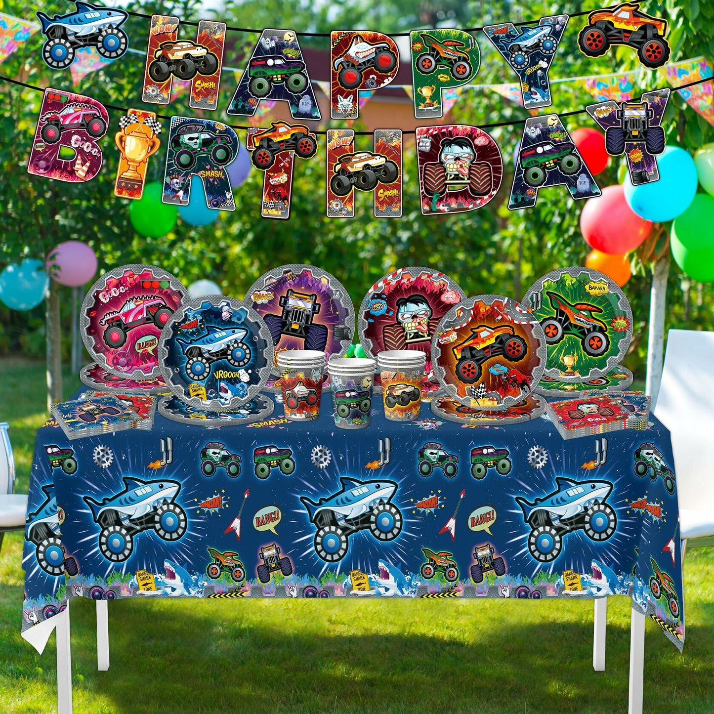 Truck-themed birthday party supplies including a tablecloth, plates, cups, and a banner with colorful designs.