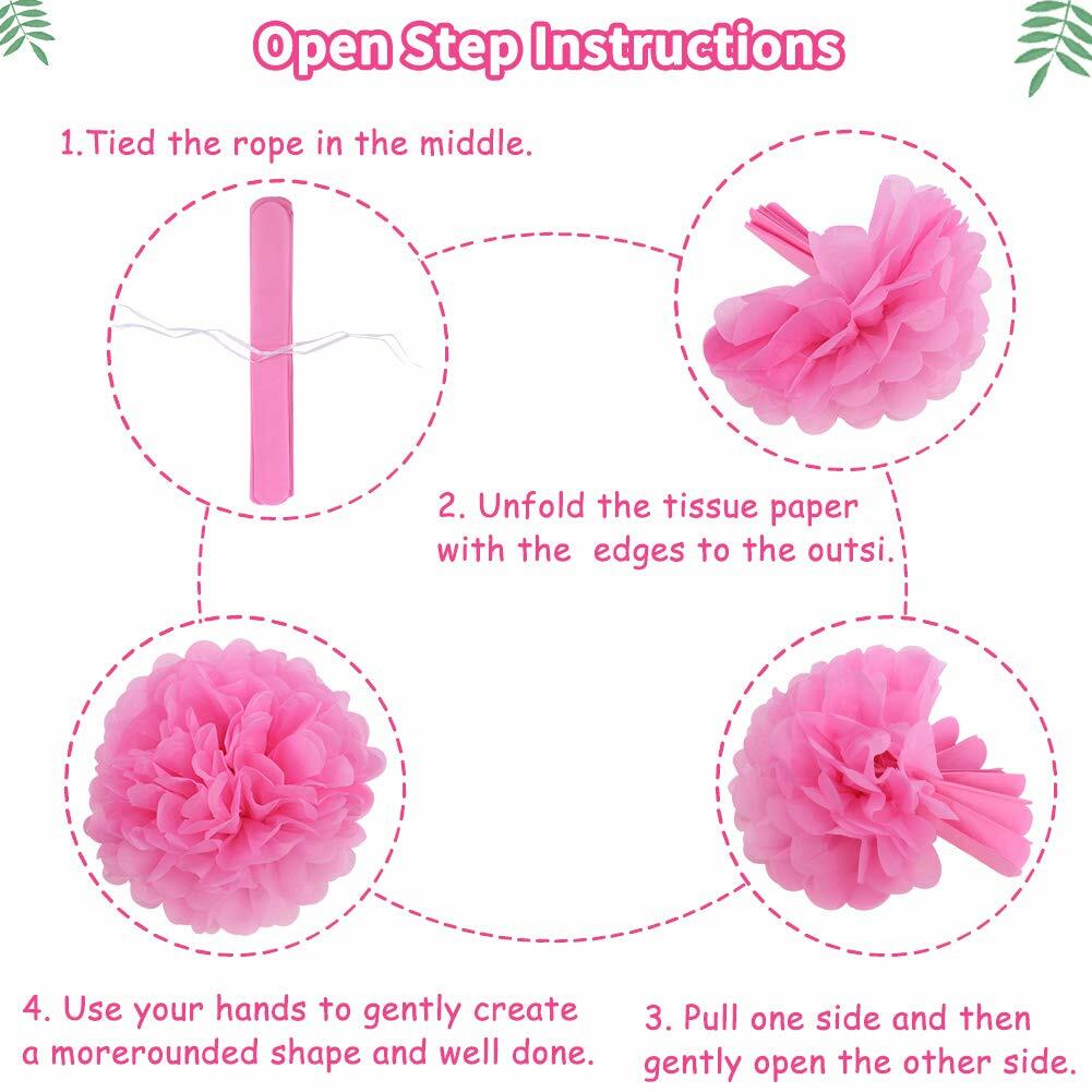 Flamingo pineapple party decorations featuring pink paper lanterns, fans, and pom poms in a festive arrangement.