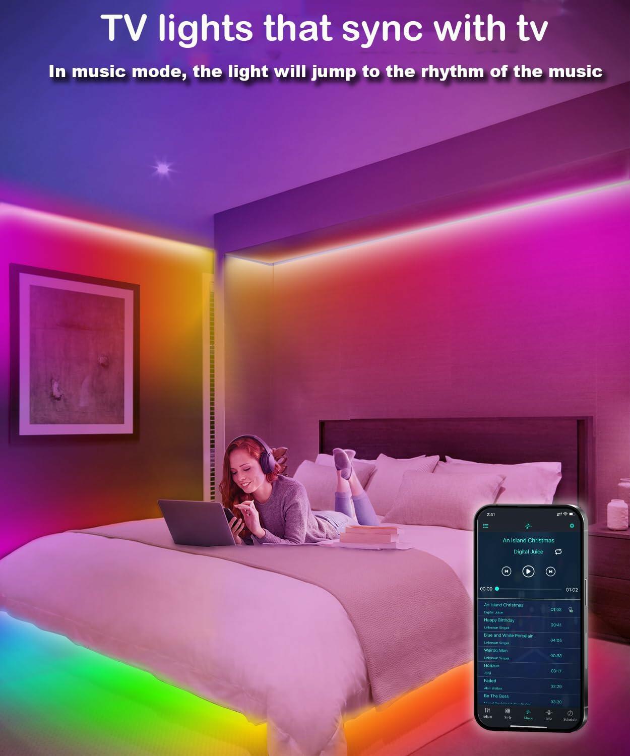 Pink and purple LED strip lights installed along the ceiling and bed frame in a bedroom with a woman using a laptop.