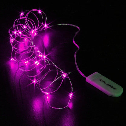 Purple LED string lights with USB power bank on a black background