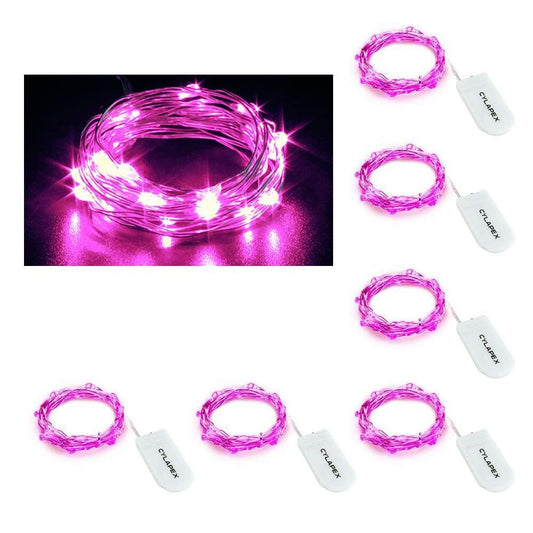 Pink LED string lights with chargers on a white background