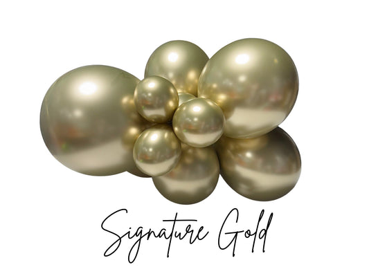 Gold balloons with 'Signature Gold' text on a white background