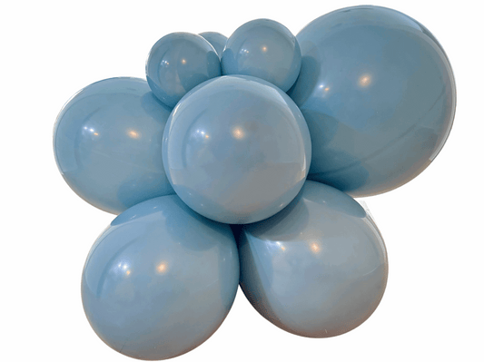 Cluster of light blue balloons on a white background