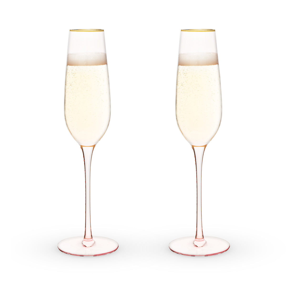 Two champagne flutes with a light pink rim and base filled with champagne on a white background