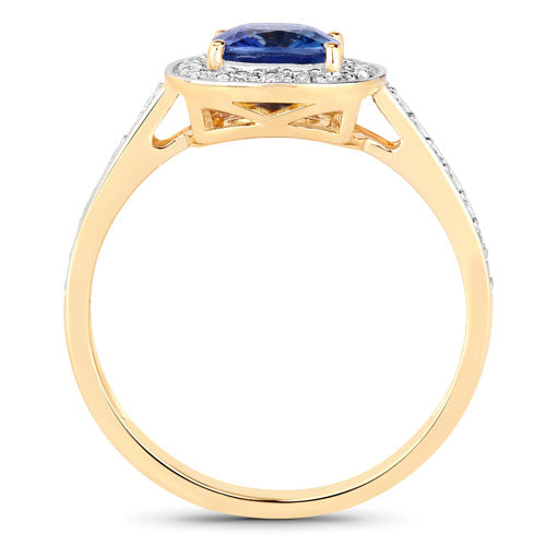 Genuine blue sapphire and white diamond ring in 18K yellow gold, featuring a 1.31 carat oval sapphire.