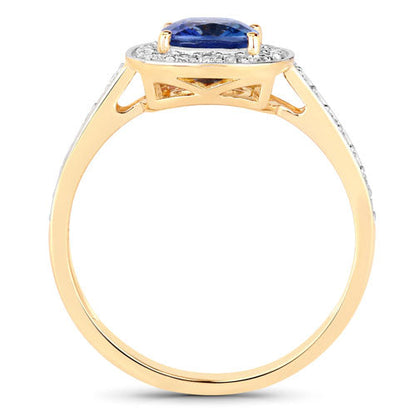 Genuine blue sapphire and white diamond ring in 18K yellow gold, featuring a 1.31 carat oval sapphire.