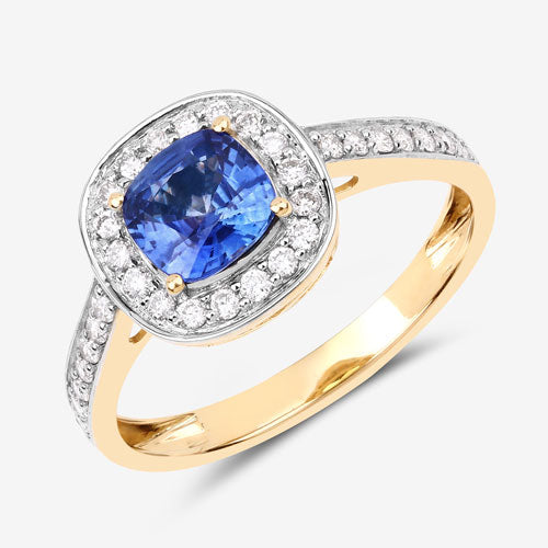 Genuine blue sapphire and white diamond ring in 18K yellow gold, featuring a cushion-cut sapphire and diamond halo.