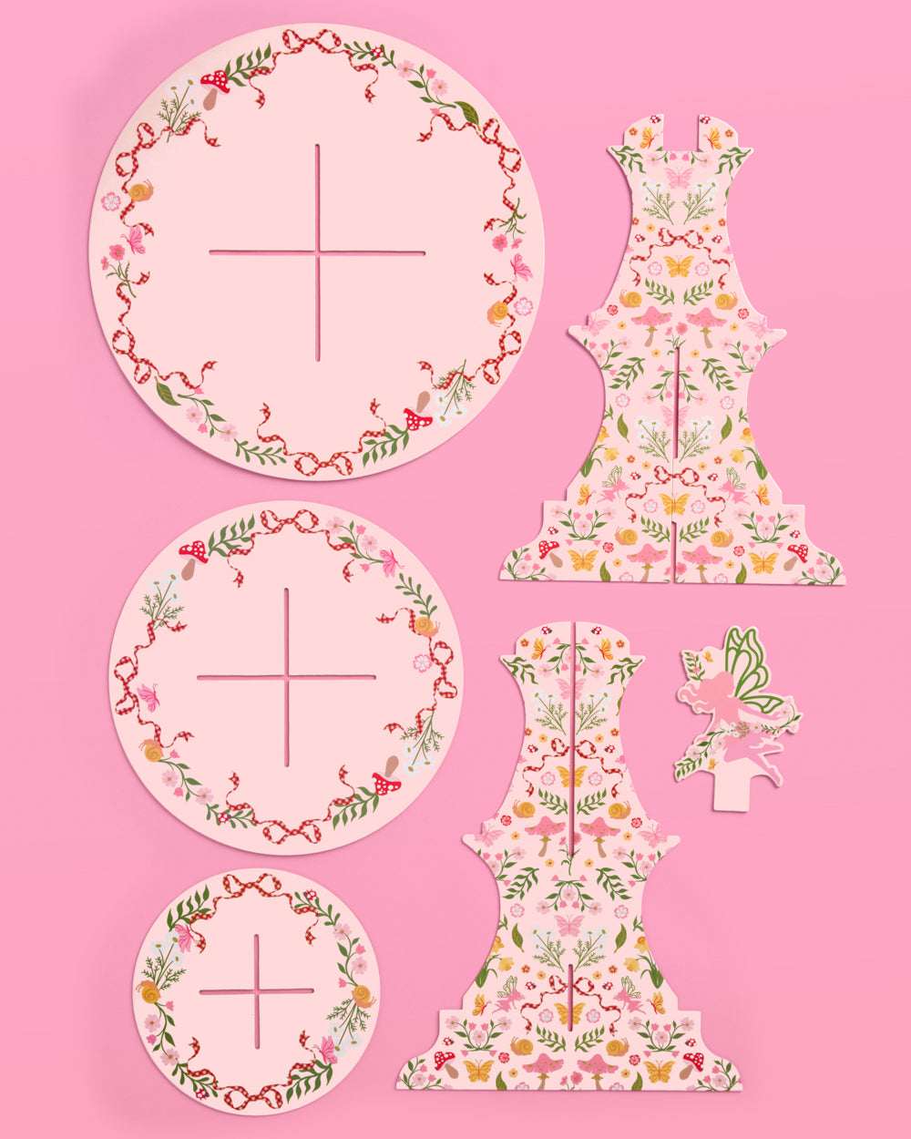 Floral-patterned cutout letters 'A' and 'B' on a pink background