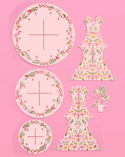 Floral-patterned cutout letters 'A' and 'B' on a pink background