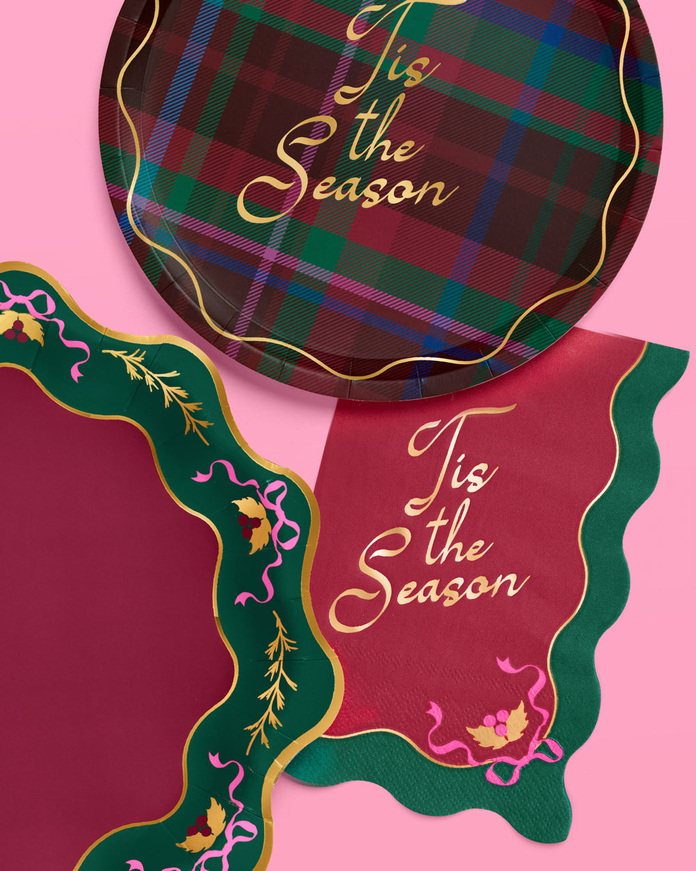 Plaid paper plates with 'Tis the Season' text on a pink background