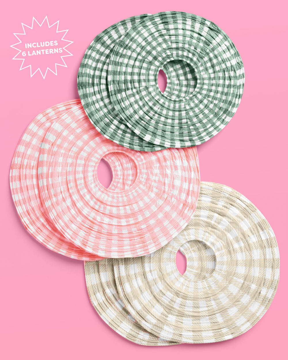Three circular lanterns with checkered patterns on a pink background