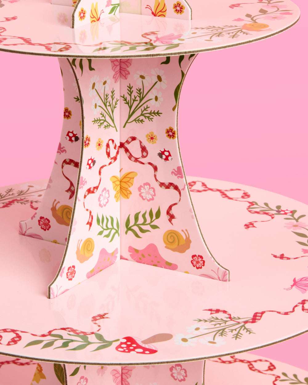 Floral-patterned table with pink background