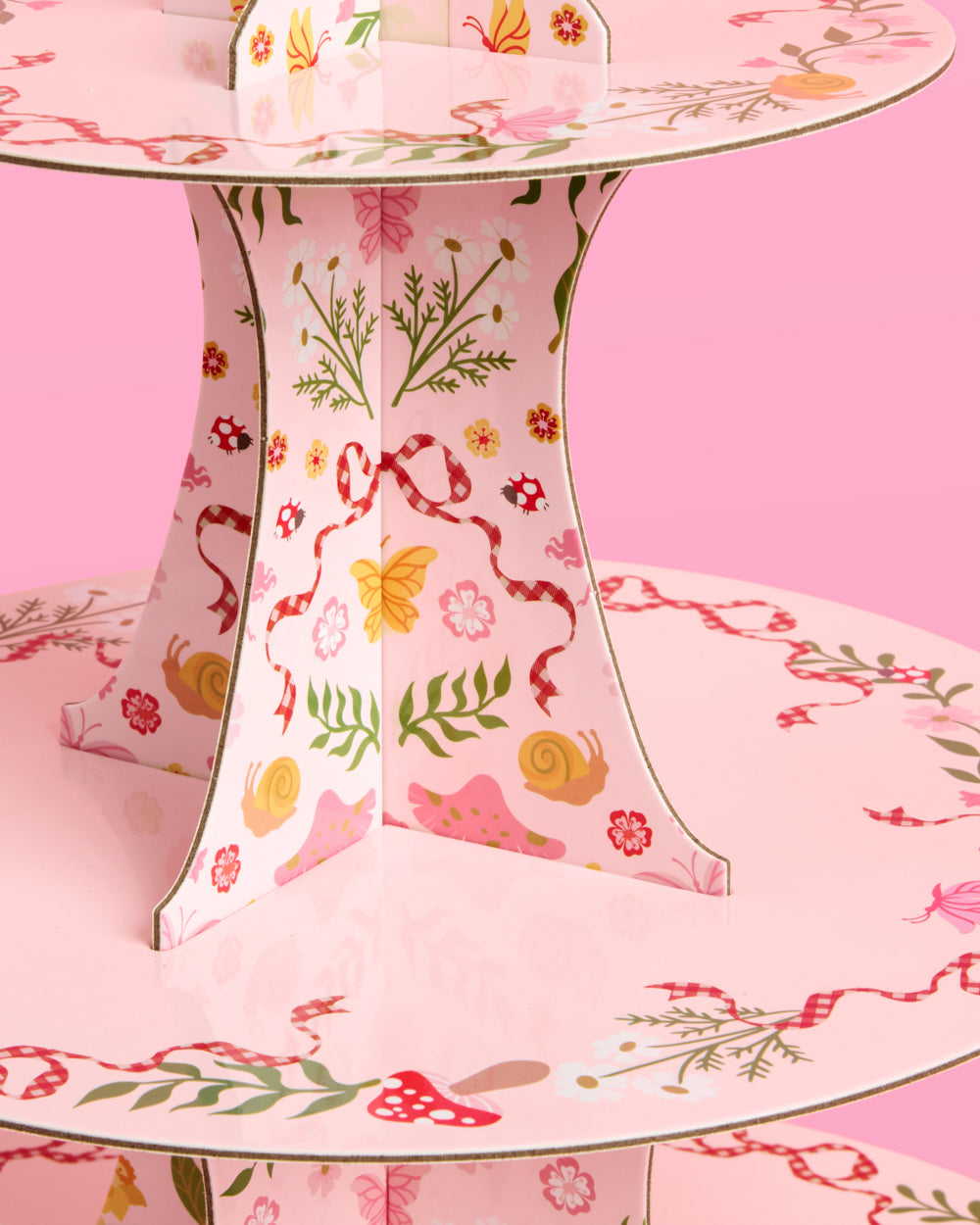 Floral-patterned table with pink background