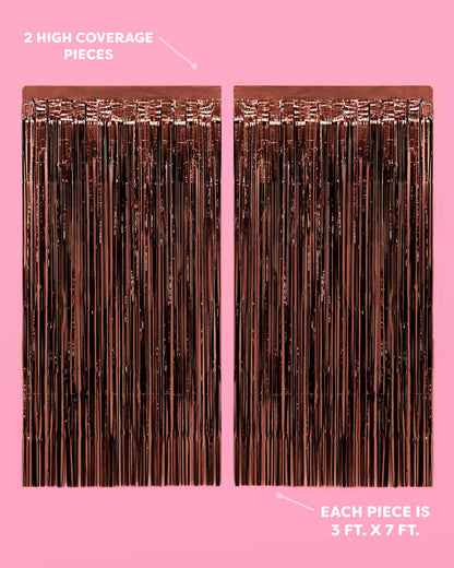 Two brown fringe curtains on a pink background with text indicating size and coverage.
