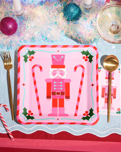 Christmas-themed placemat with nutcracker design on a festive table setting.