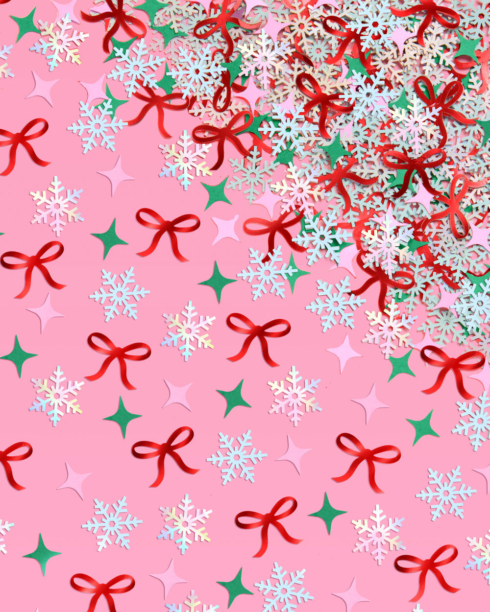Christmas-themed pattern with bows, snowflakes, and stars on a pink background