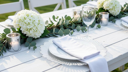 Silver themed tablescape featuring a silver charger plate.
