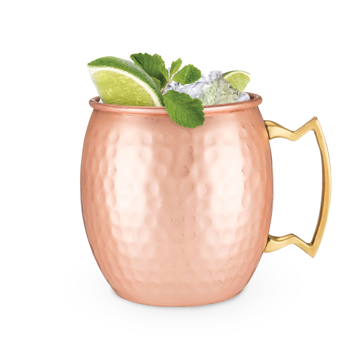 Hammered copper mule mug filled with ice and garnished with lime wedges and fresh mint.