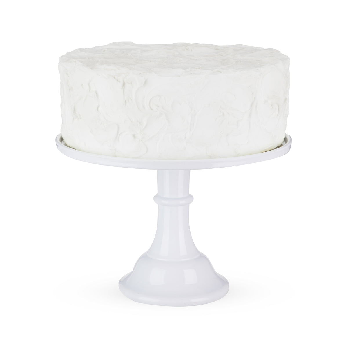 White melamine cake stand with a white cake on it.