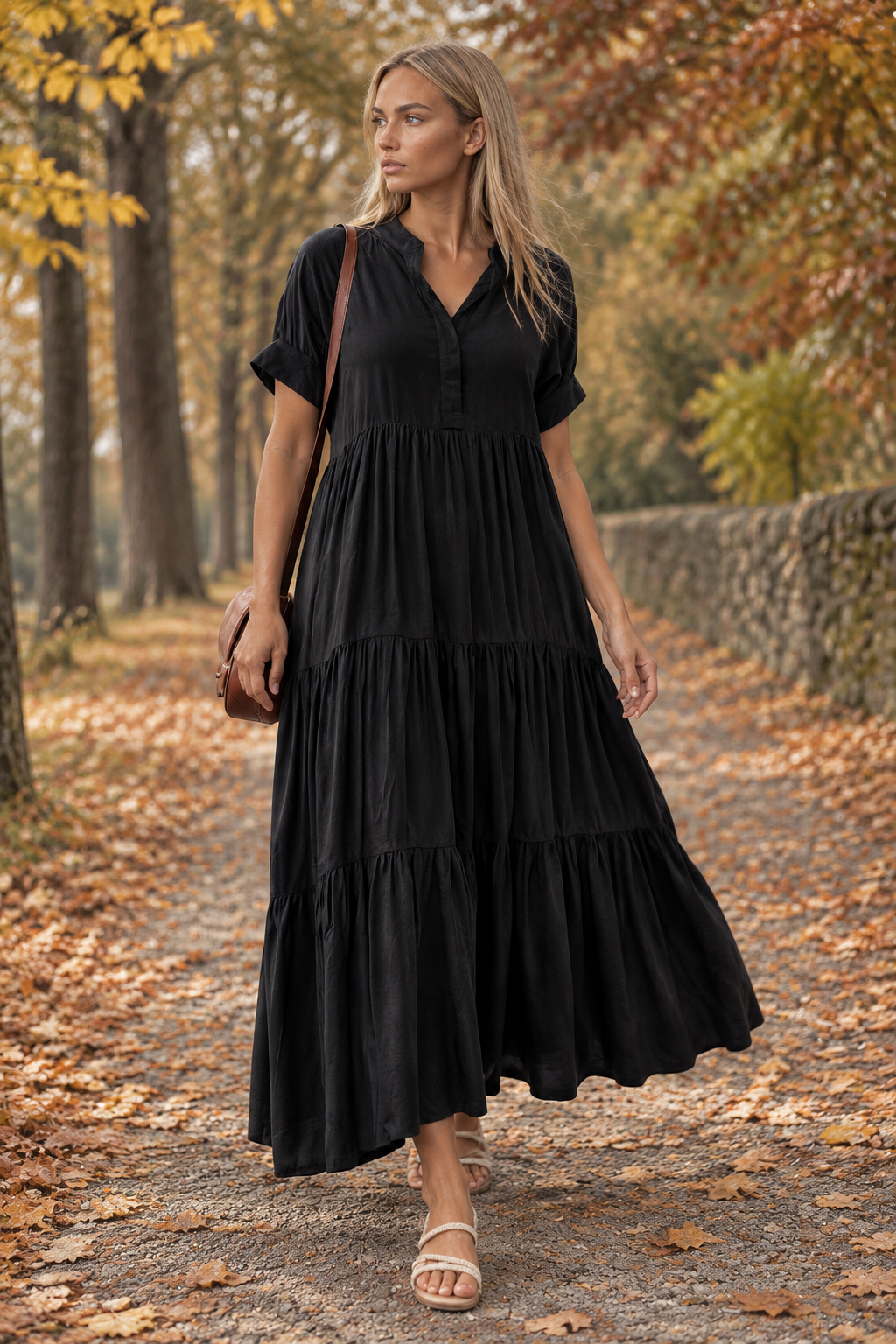 Woman wearing the Selah dress in an autumn setting